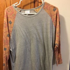 Gray body with orange sleeves with detail